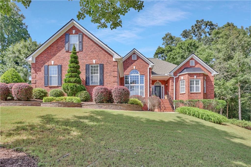 5 bedroom, 3 bathroom, 5,282 sq ft single family residence sold at 1616 Holly Ridge Drive, Loganville, GA 30052