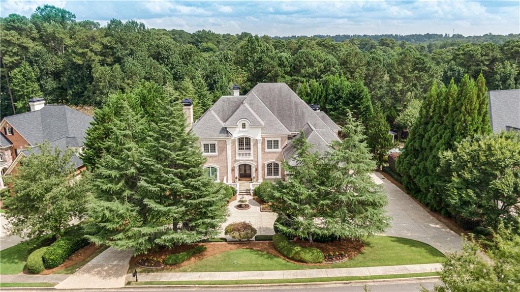 7 bedroom, 9 bathroom, 9,644 sq ft single family residence sold at 2200 Blackheath Trace, Alpharetta, GA 30005