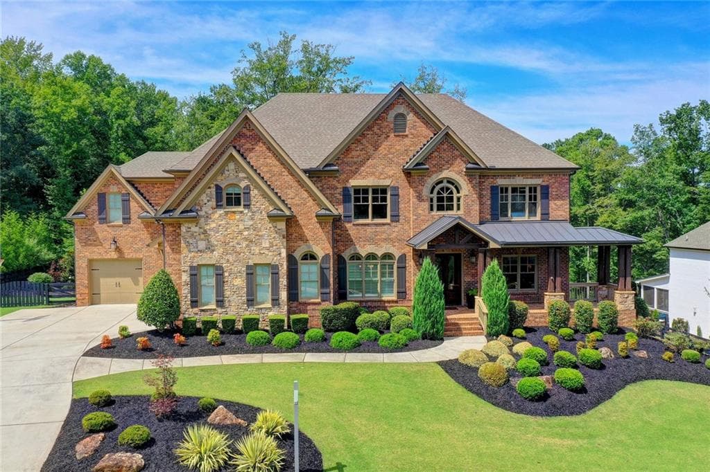 6 bedroom, 7 bathroom, 8,587 sq ft single family residence sold at 16820 Quayside Drive, Milton, GA 30004