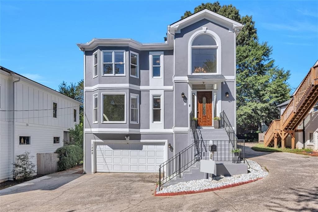 4 bedroom, 4 bathroom, 3,433 sq ft single family residence sold at 1242 Monroe Drive, Atlanta, GA 30306