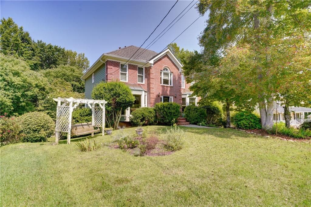 4 bedroom, 3 bathroom, 2,412 sq ft single family residence sold at 416 Wood Branch Street, Woodstock, GA 30188
