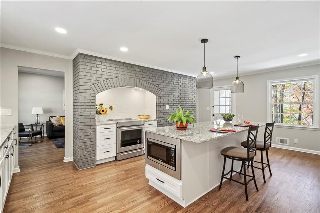 5 bedroom, 4 bathroom, 3,100 sq ft single family residence sold at 1705 Lilburn Stone Mountain Road, Stone Mountain, GA 30087