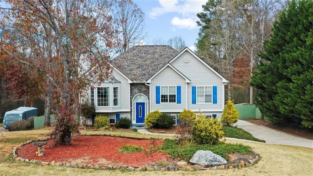 5 bedroom, 3 bathroom, 2,561 sq ft single family residence sold at 6050 Ashbury Lane, Cumming, GA 30028