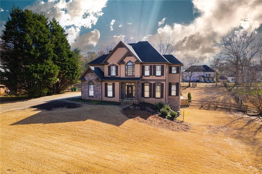 4 bedroom, 3 bathroom, 2,508 sq ft single family residence sold at 1058 Avery Creek Drive, Woodstock, GA 30188