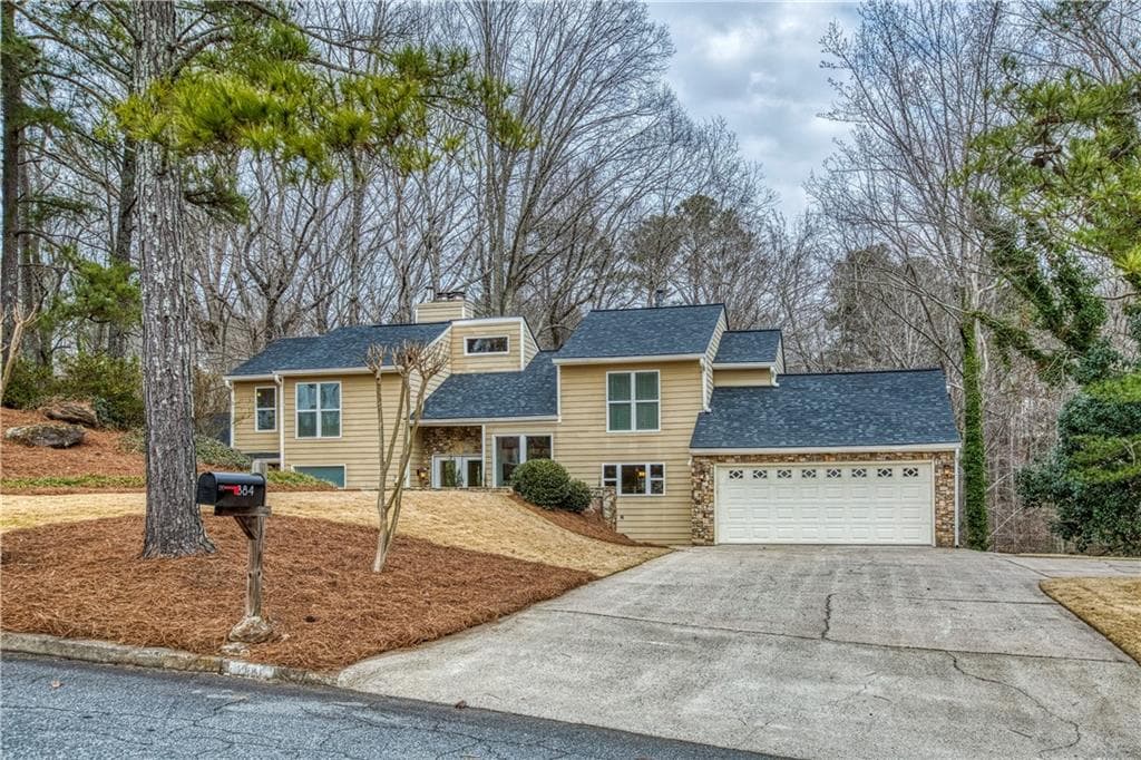 5 bedroom, 5 bathroom, 3,307 sq ft single family residence sold at 884 Oakhaven Drive, Roswell, GA 30075