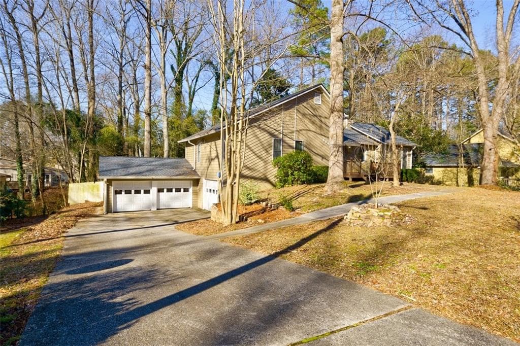 4 bedroom, 3 bathroom, 2,327 sq ft single family residence sold at 5040 River Valley Drive, Smyrna, GA 30082