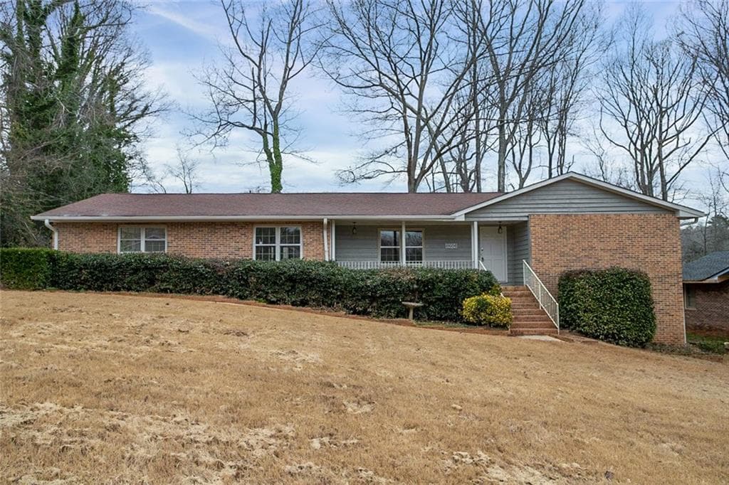 4 bedroom, 3 bathroom, 1,890 sq ft single family residence sold at 1050 Forest Heights Road, Stone Mountain, GA 30083