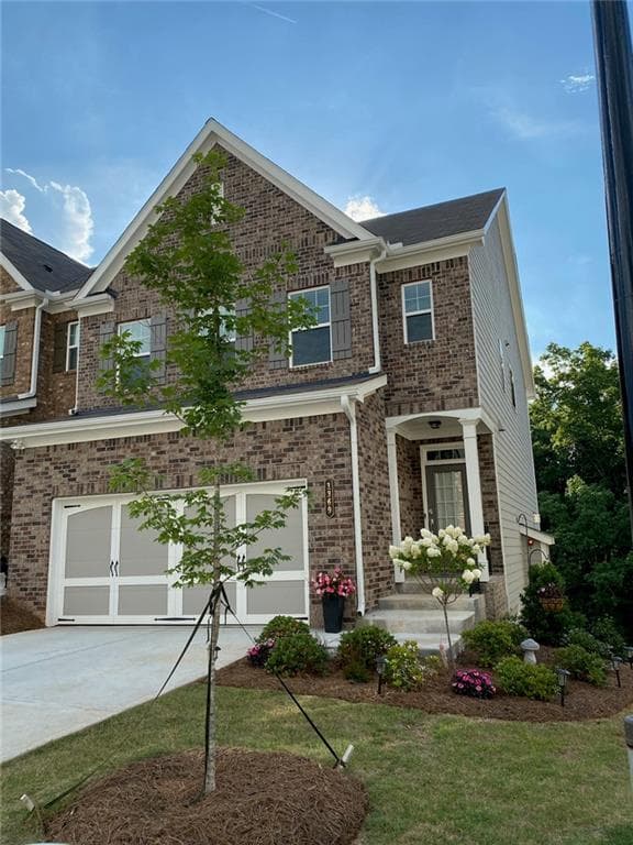 3 bedroom, 3 bathroom, 1,910 sq ft townhouse sold at 1369 Elderwood Way, Cumming, GA 30041