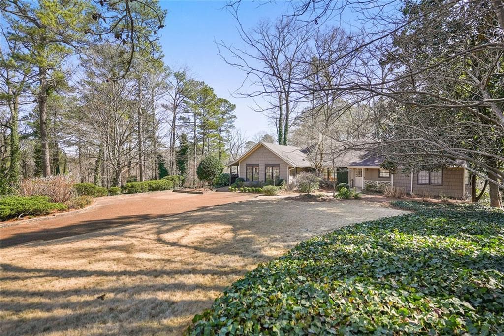 5 bedroom, 4 bathroom, 4,663 sq ft single family residence sold at 4795 Woodvale Drive, Atlanta, GA 30327 — photo 1 of 1