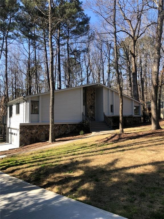 5 bedroom, 3 bathroom, 2,600 sq ft single family residence sold at 4379 Wood Creek Drive, Marietta, GA 30062