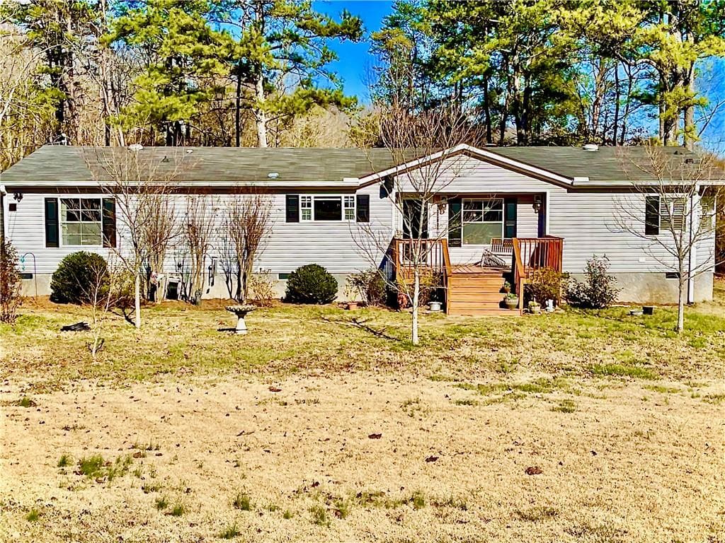 3 bedroom, 2 bathroom, 2,100 sq ft single family residence sold at 6505 Millwood Road, Cumming, GA 30041