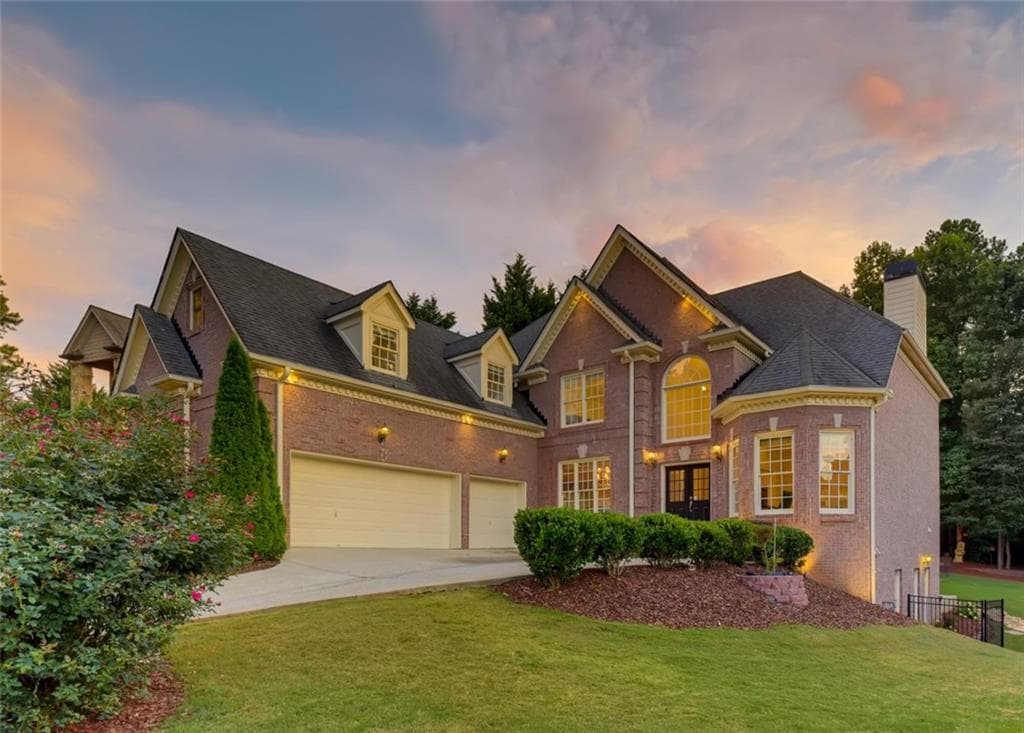 6 bedroom, 5 bathroom, 6,404 sq ft single family residence sold at 128 KIA Drive, Alpharetta, GA 30022