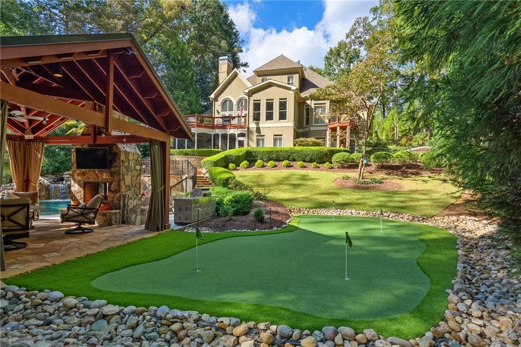 5 bedroom, 6 bathroom, 6,789 sq ft single family residence sold at 110 Champions Club Court, Alpharetta, GA 30004