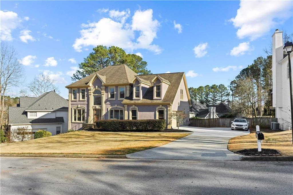 6 bedroom, 4 bathroom, 4,274 sq ft single family residence sold at 2225 WILDWOOD LAKE Drive, Suwanee, GA 30024