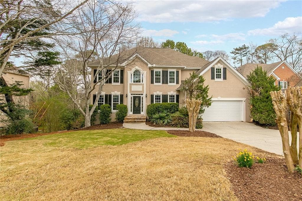 5 bedroom, 4 bathroom, 4,329 sq ft single family residence sold at 10940 Donamere Drive, Johns Creek, GA 30022