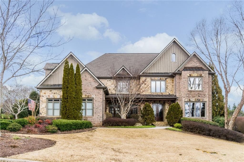 7 bedroom, 6 bathroom, 6,600 sq ft single family residence sold at 2710 Hermitage Drive, Cumming, GA 30041