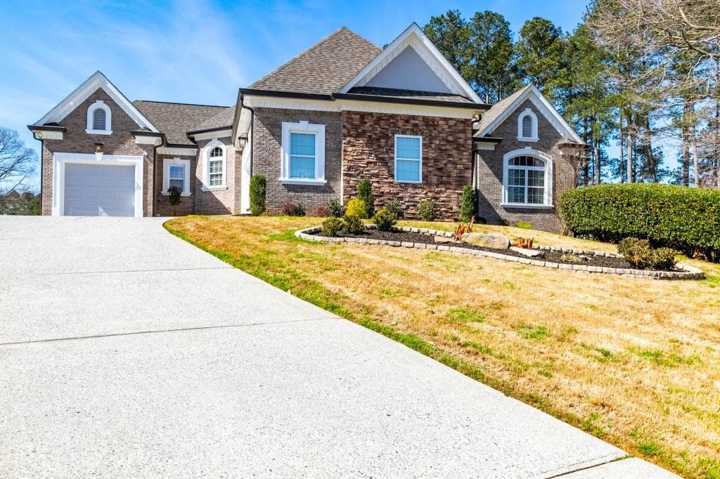 4 bedroom, 4 bathroom, 6,384 sq ft single family residence sold at 1225 Ewing Ives Drive, Dacula, GA 30019