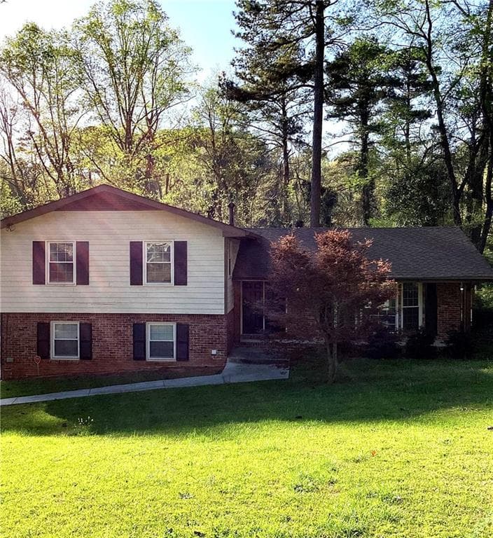 4 bedroom, 3 bathroom, 2,026 sq ft single family residence sold at 2111 Rolling View Drive, Decatur, GA 30032