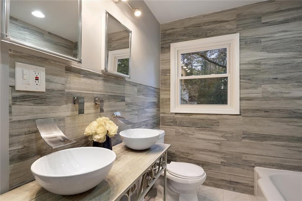 5 bedroom, 3 bathroom, 1,744 sq ft single family residence sold at 1036 LYNHURST Drive, Atlanta, GA 30311