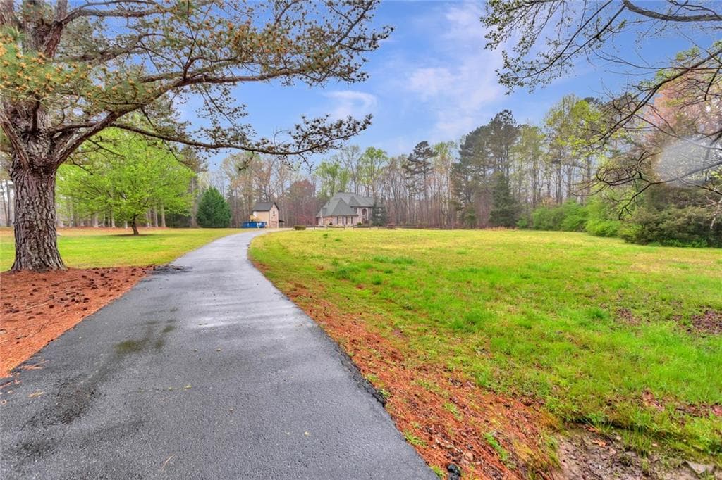 5 bedroom, 5 bathroom, 5,913 sq ft single family residence sold at 1451 Harbins Road, Dacula, GA 30019