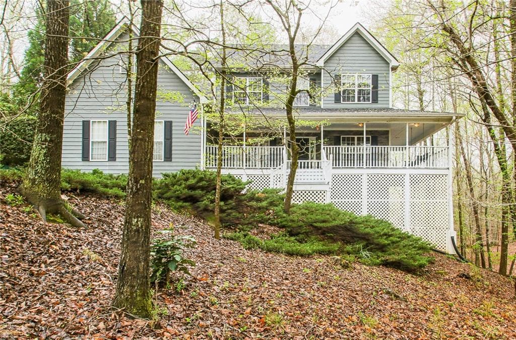 4 bedroom, 4 bathroom, 3,472 sq ft single family residence sold at 7340 Breeze Bay Road, Cumming, GA 30041