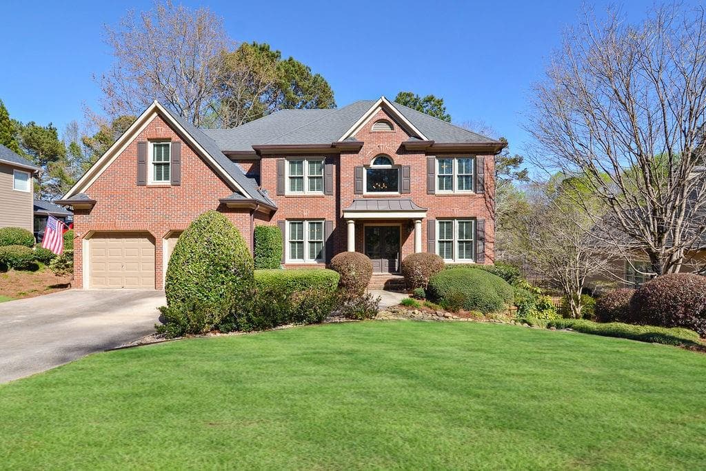 6 bedroom, 5 bathroom, 5,125 sq ft single family residence sold at 610 Goldpoint Trace, Woodstock, GA 30189