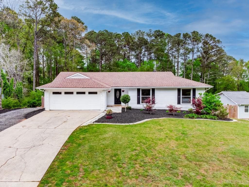 3 bedroom, 2 bathroom, 2,052 sq ft single family residence sold at 559 Rivercrest Drive, Woodstock, GA 30188