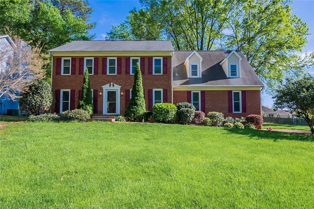 4 bedroom, 3 bathroom, 2,533 sq ft single family residence sold at 1410 Wood Valley Drive, Marietta, GA 30066