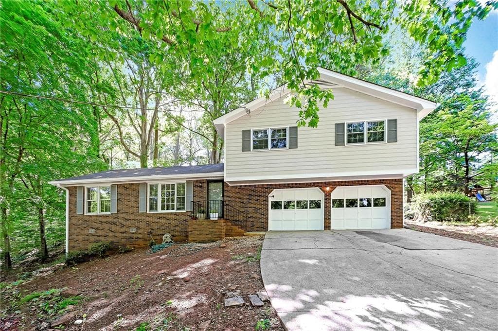 3 bedroom, 2 bathroom, 1,633 sq ft single family residence sold at 5718 Four Winds Court, Lilburn, GA 30047