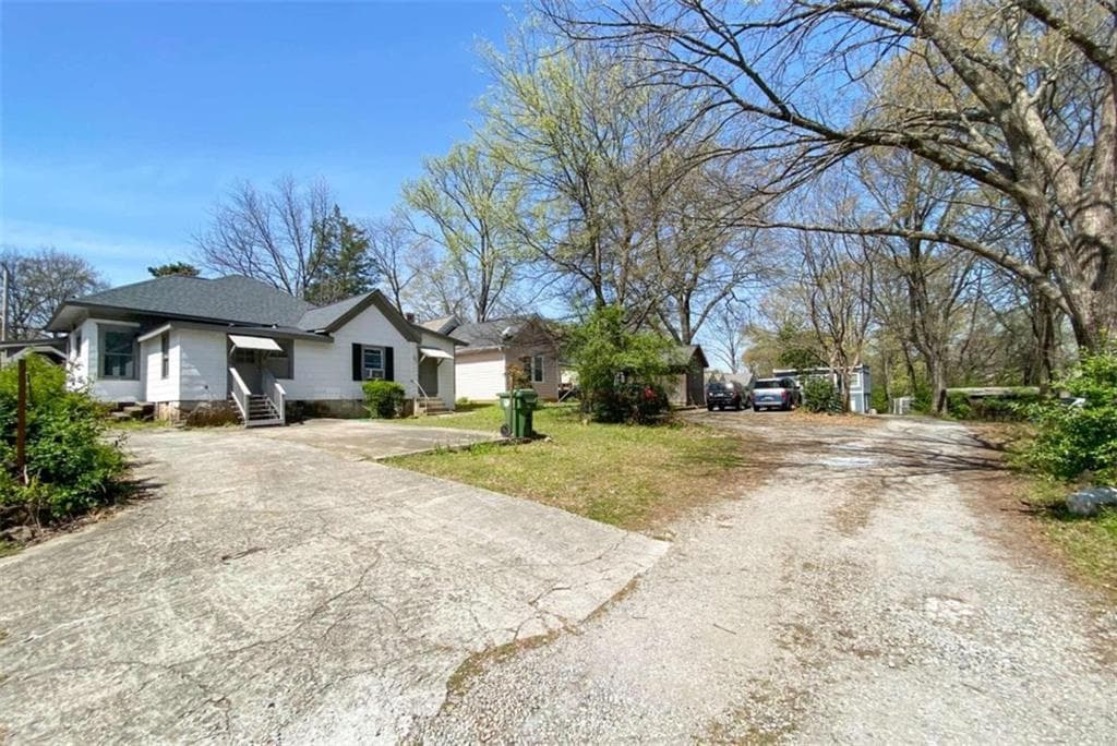 4 bedroom, 2 bathroom, 1,574 sq ft single family residence sold at 1035 Center Street, Atlanta, GA 30318