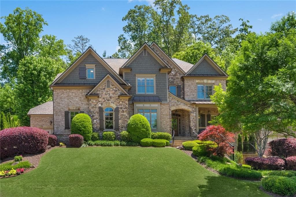 5 bedroom, 4 bathroom, 4,503 sq ft single family residence sold at 1050 Mosspointe Drive, Roswell, GA 30075