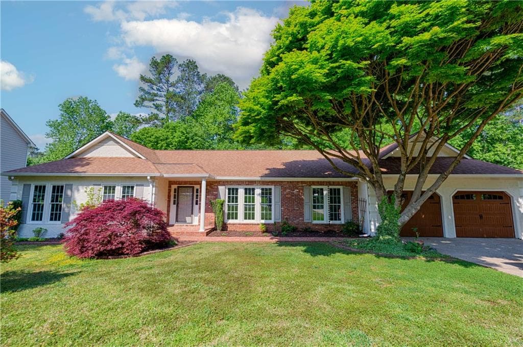 4 bedroom, 3 bathroom, 2,686 sq ft single family residence sold at 4491 Windsor Oaks Drive, Marietta, GA 30066