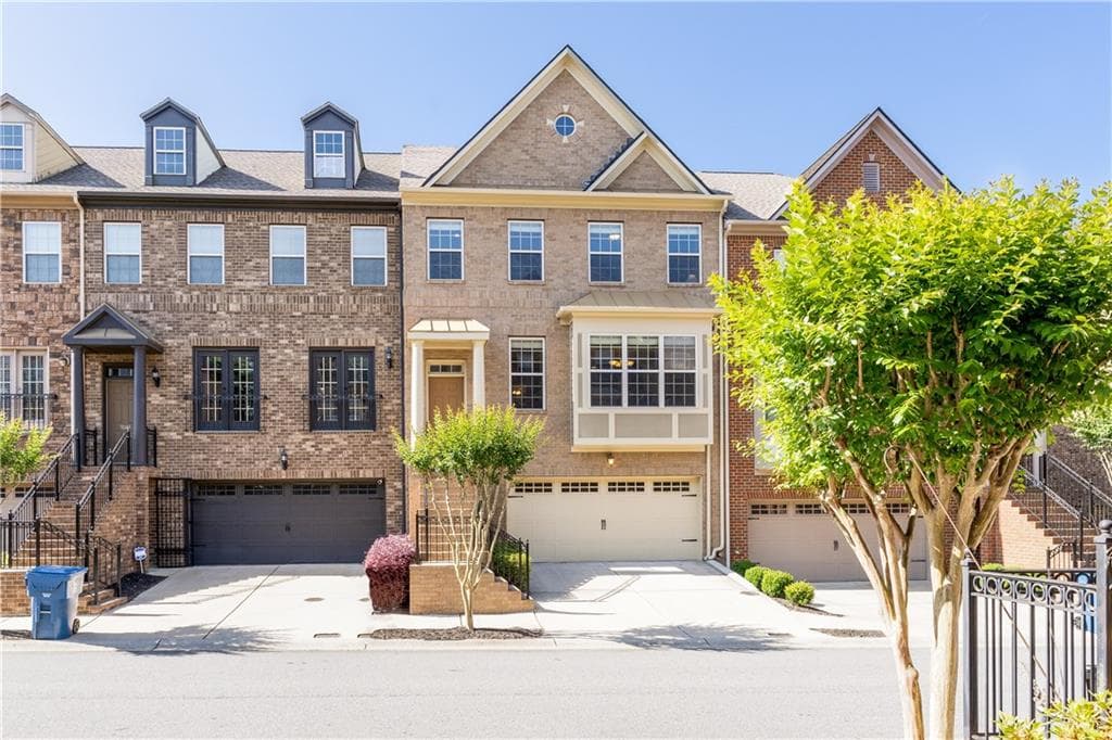 3 bedroom, 4 bathroom, 2,436 sq ft townhouse sold at 9045 Woodland Trail, Alpharetta, GA 30009