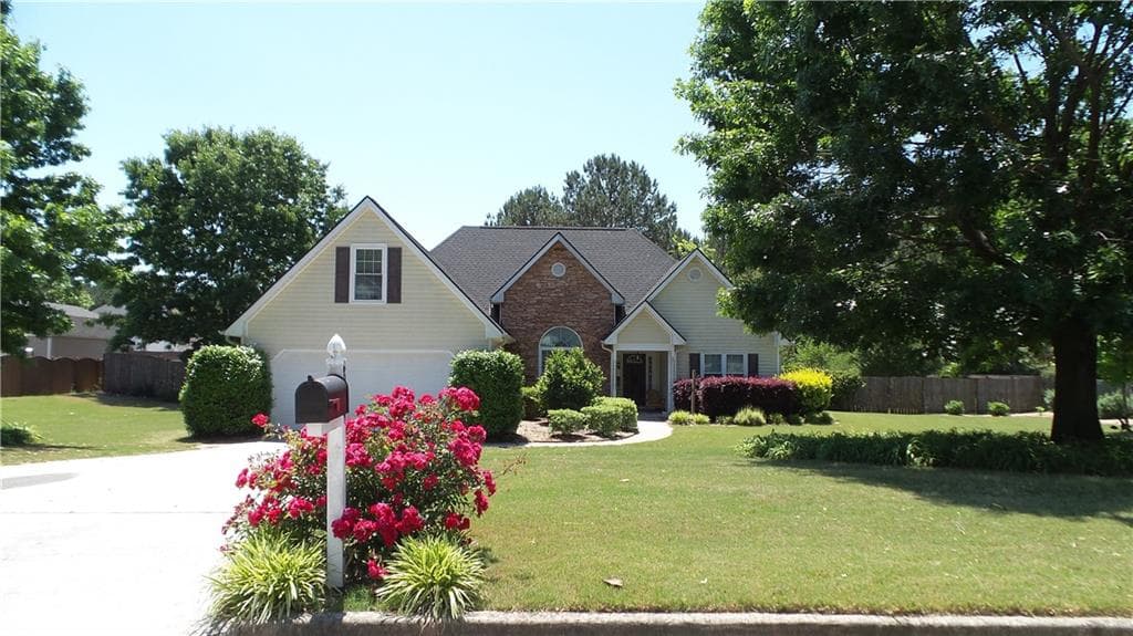 4 bedroom, 2 bathroom, 2,275 sq ft single family residence sold at 819 Winding Grove Lane, Loganville, GA 30052
