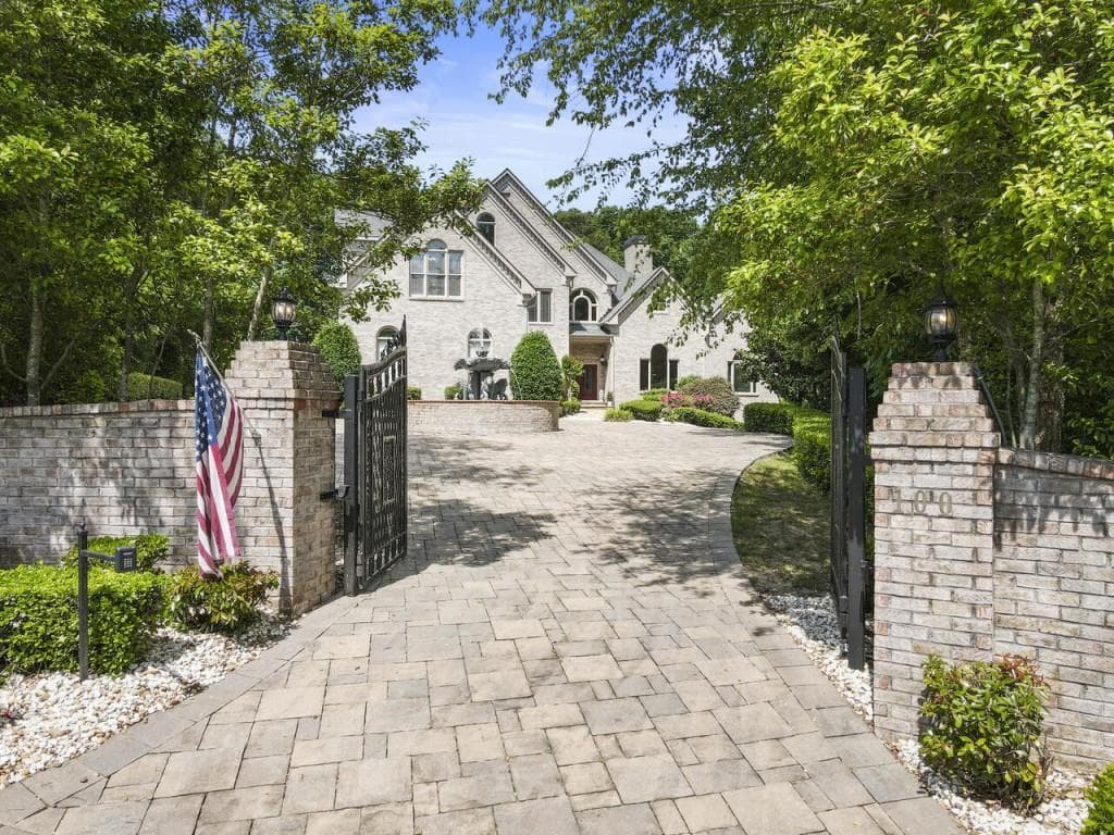 7 bedroom, 9 bathroom, 9,700 sq ft single family residence sold at 100 Thomas Creek Court, Milton, GA 30004