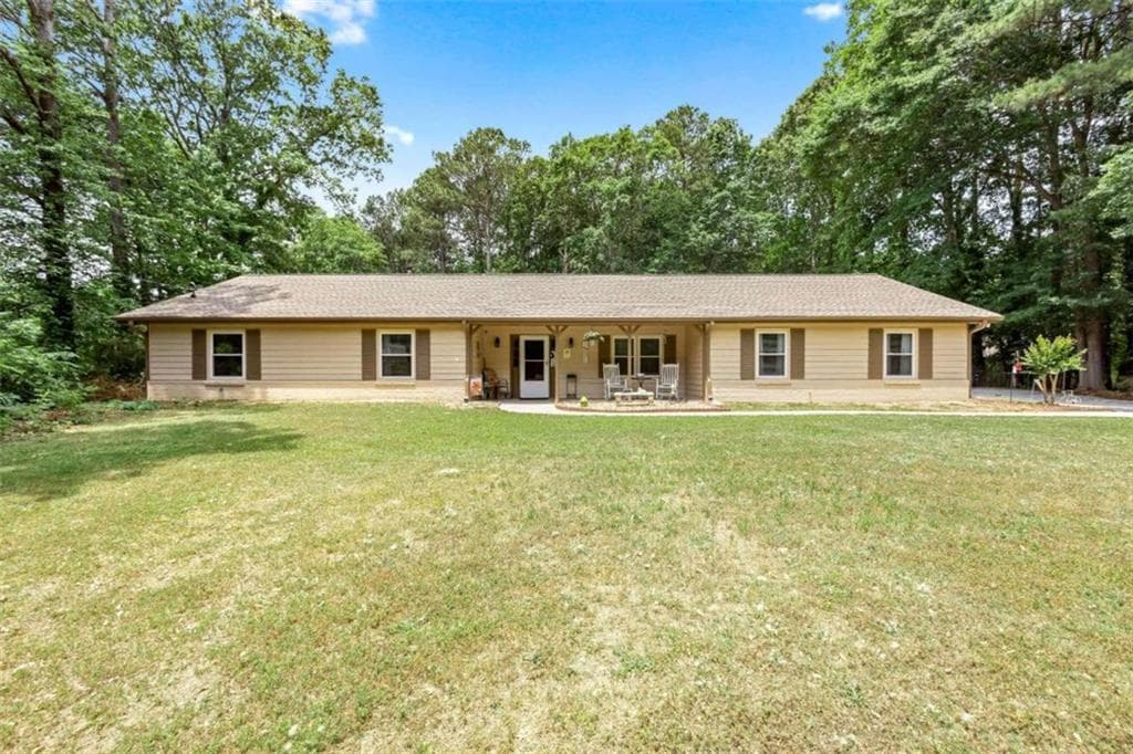 4 bedroom, 3 bathroom single family residence sold at 2433 Raven Wood Court, Snellville, GA 30078