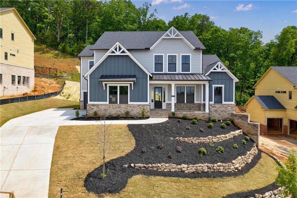 6 bedroom, 6 bathroom, 6,321 sq ft single family residence sold at 5005 Concert Lane, Marietta, GA 30066