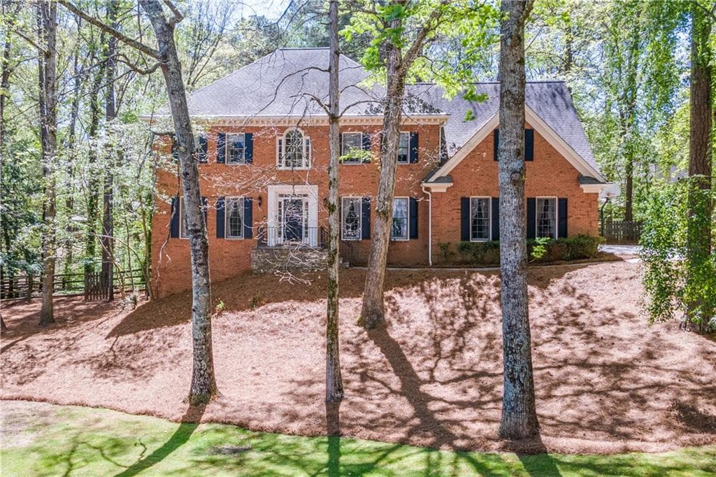 4 bedroom, 5 bathroom, 4,129 sq ft single family residence sold at 215 Cliffchase Close, Roswell, GA 30076
