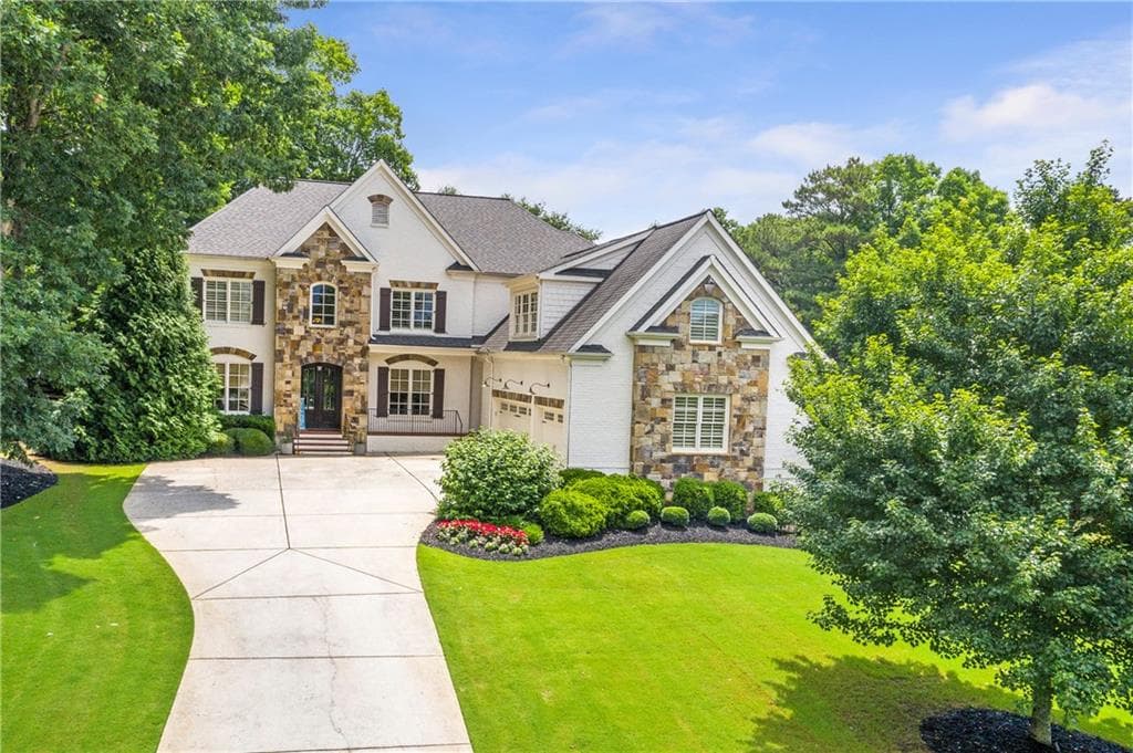6 bedroom, 7 bathroom, 7,095 sq ft single family residence sold at 11413 Valmont Lane, Milton, GA 30004