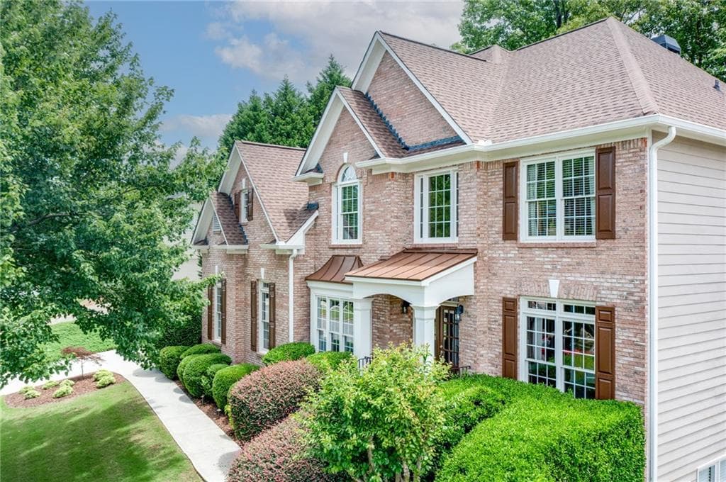 6 bedroom, 4 bathroom, 4,756 sq ft single family residence sold at 595 Sentry Ridge Crossing, Suwanee, GA 30024