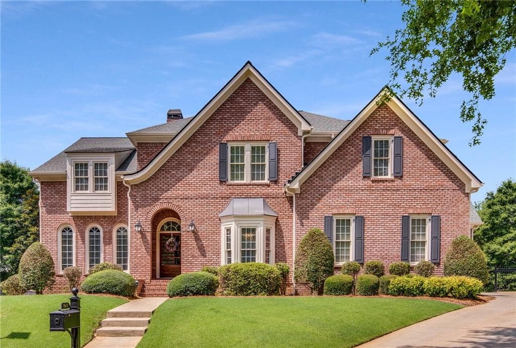 6 bedroom, 6 bathroom, 6,128 sq ft single family residence sold at 943 Tarry Post Court, Suwanee, GA 30024