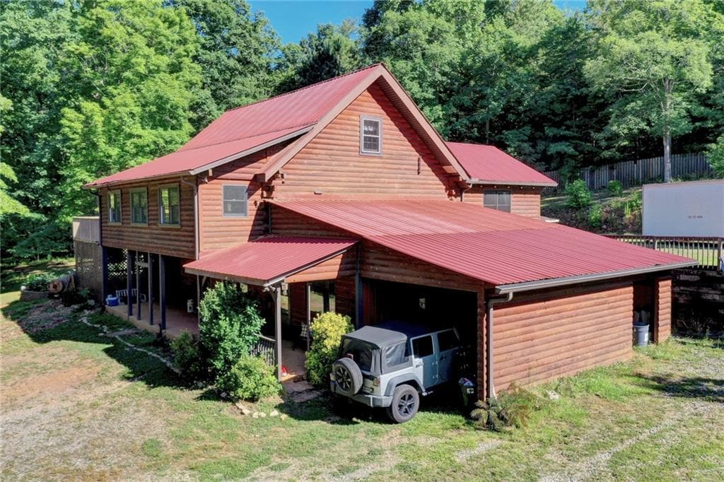 4 bedroom, 2 bathroom, 3,525 sq ft single family residence sold at 955 SMITH Circle, Dawsonville, GA 30534
