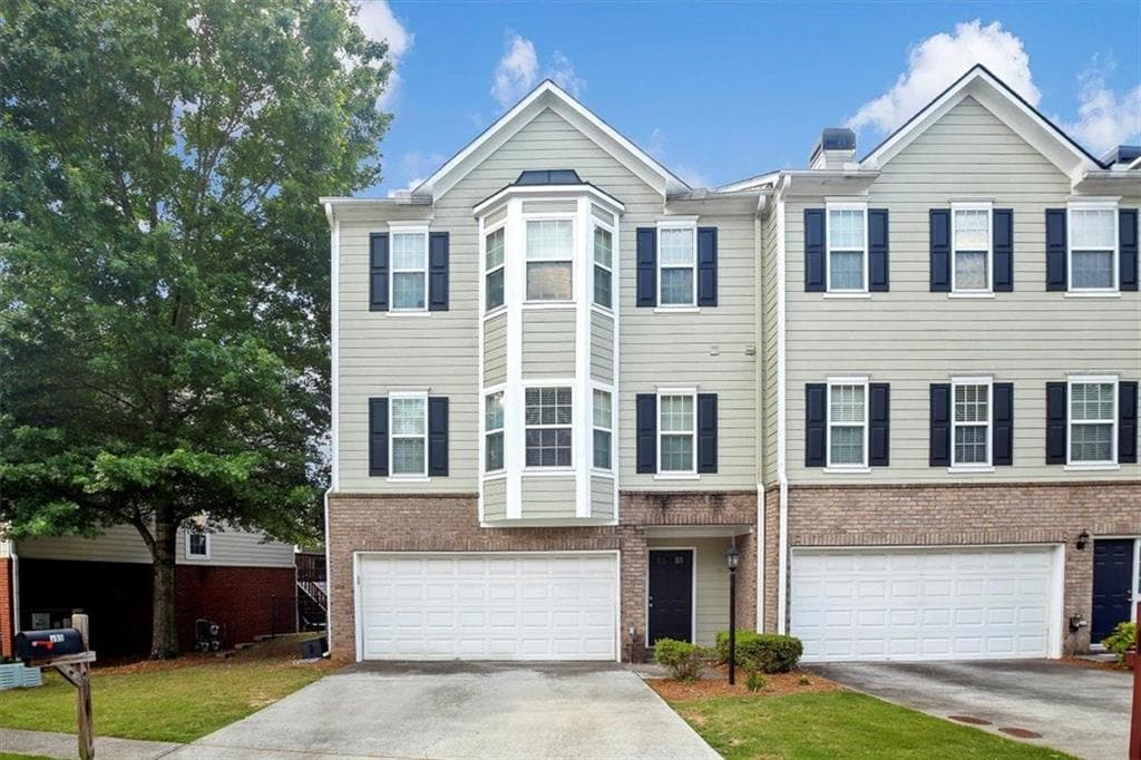 3 bedroom, 3 bathroom, 1,800 sq ft townhouse sold at 395 EAGLE TIFF Drive, Sugar Hill, GA 30518