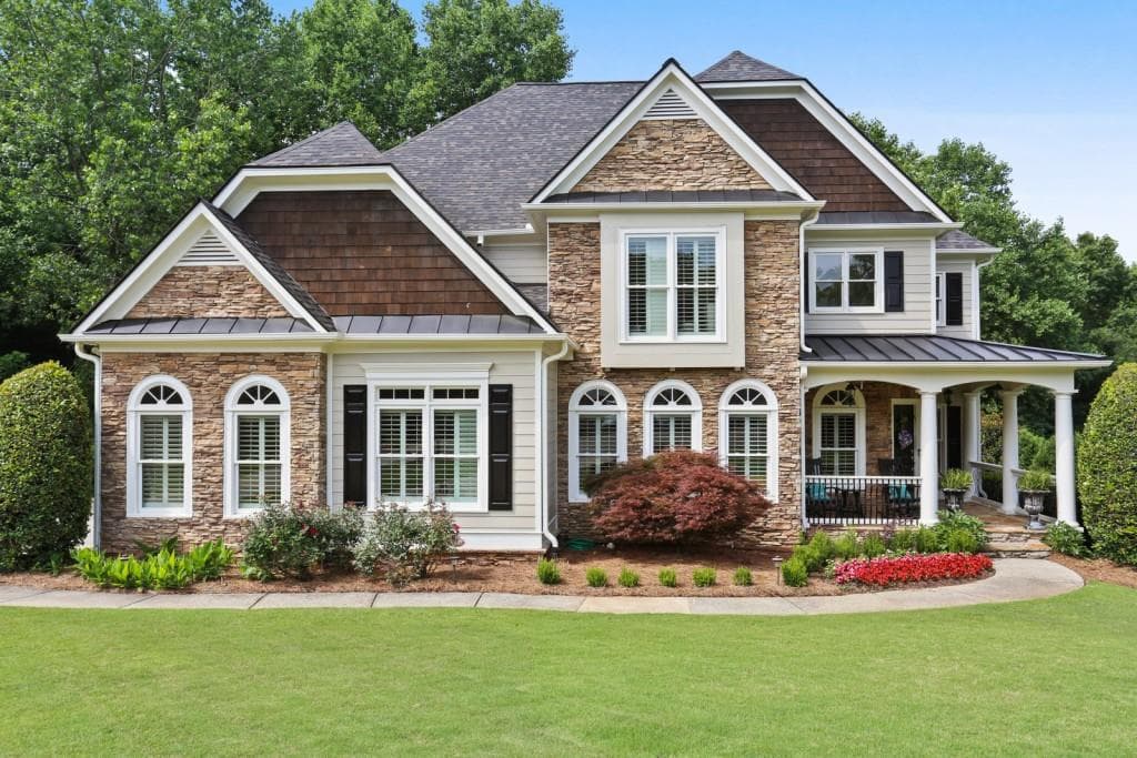 6 bedroom, 5 bathroom, 5,077 sq ft single family residence sold at 573 Devon Brooke Drive, Woodstock, GA 30188