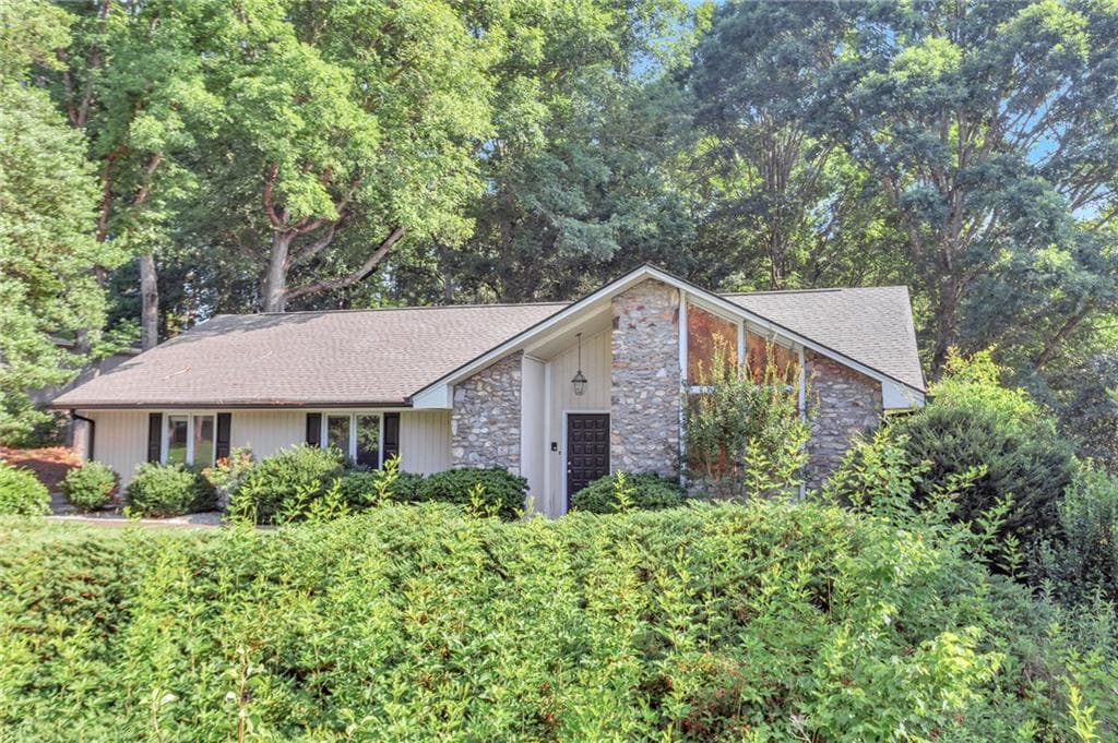 4 bedroom, 4 bathroom, 3,118 sq ft single family residence sold at 1365 Oakhaven Drive, Roswell, GA 30075