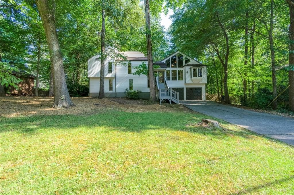 4 bedroom, 3 bathroom, 2,600 sq ft single family residence sold at 4910 Tremont Drive, Marietta, GA 30066