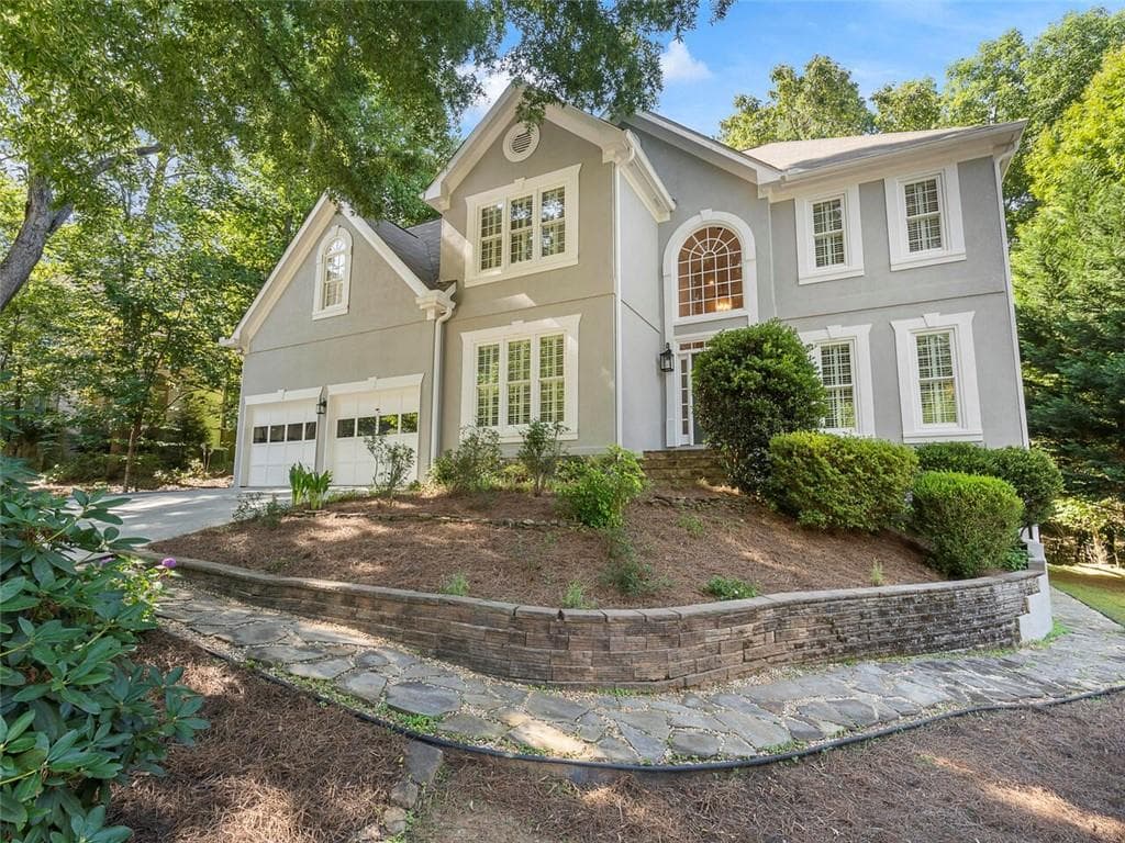 5 bedroom, 4 bathroom, 5,016 sq ft single family residence sold at 9230 Twelvestones Drive, Roswell, GA 30076