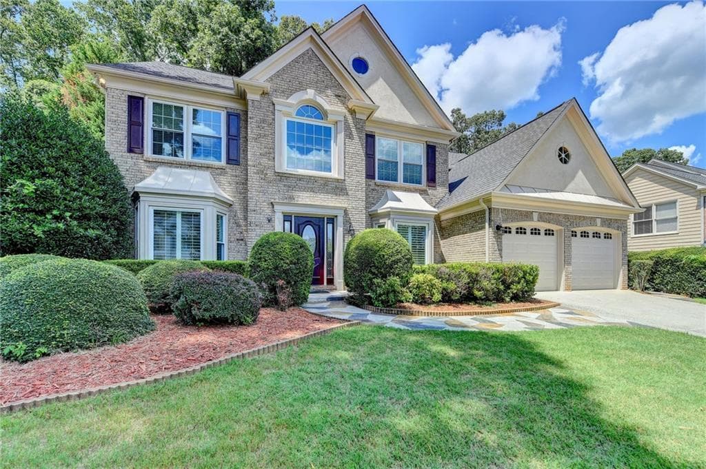 4 bedroom, 3 bathroom, 3,056 sq ft single family residence sold at 6415 Stapleford Lane, Johns Creek, GA 30097
