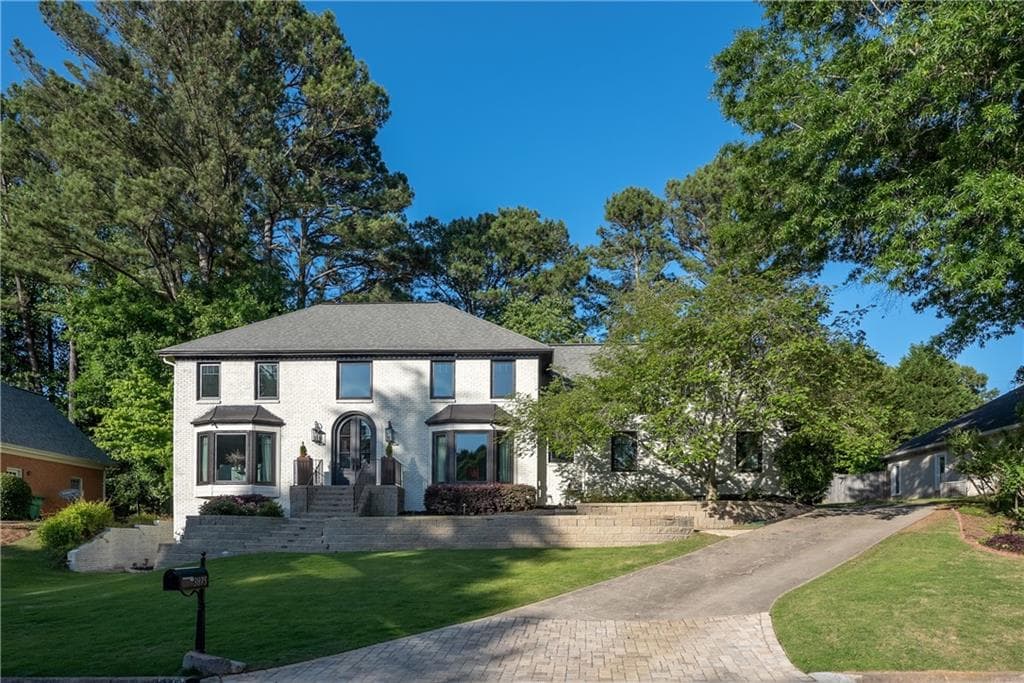 4 bedroom, 5 bathroom, 3,698 sq ft single family residence sold at 3875 Grand Forest Drive, Peachtree Corners, GA 30092
