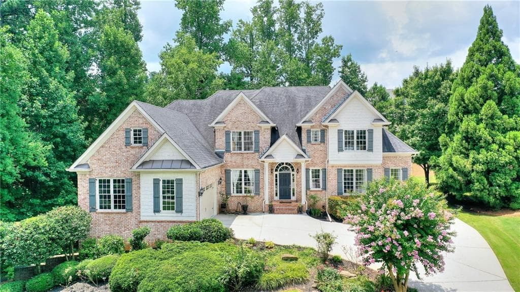 7 bedroom, 6 bathroom, 7,848 sq ft single family residence sold at 2309 Glenmore Lane, Snellville, GA 30078
